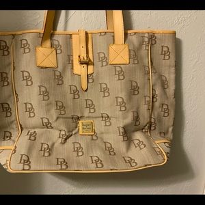 Dooney & Burke Travel Tote. NEW! Never Used! Beautiful Red Lining!20”Wx14.5”H.